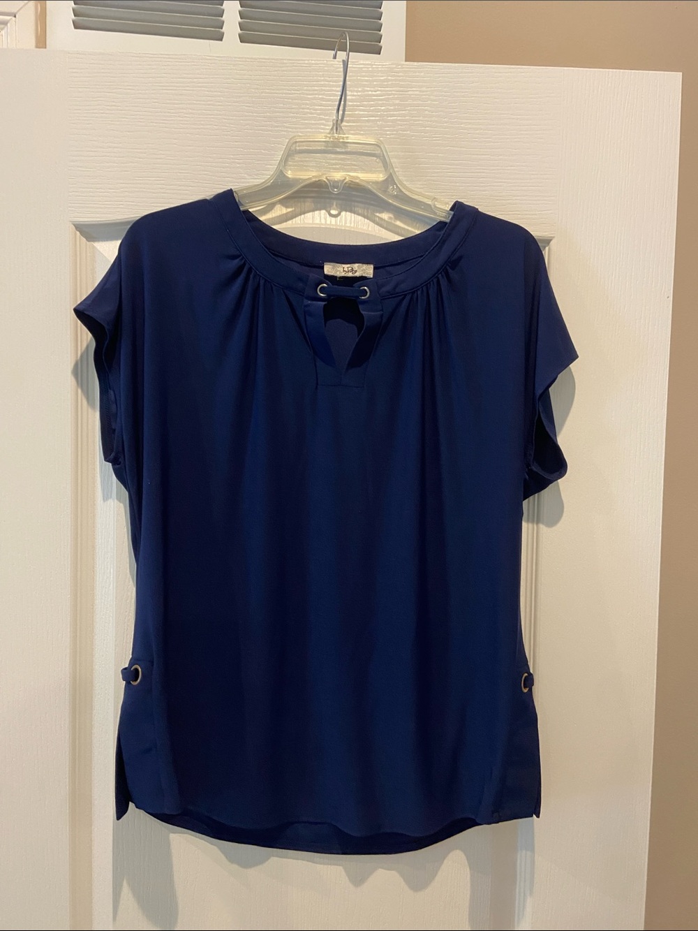 Elegant Navy Short-Sleeve Blouse with Grommet Detail